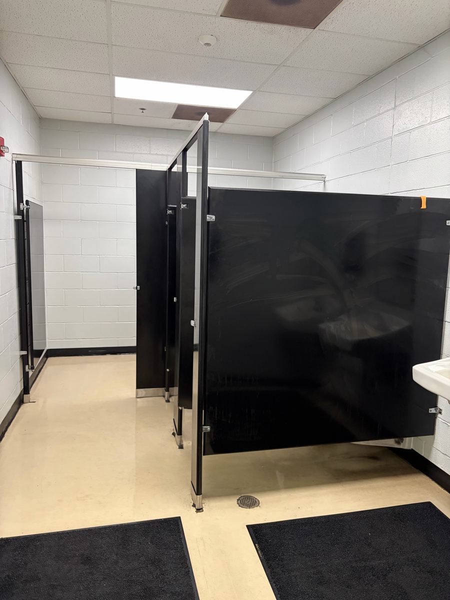 Clean commercial restroom at a West Tennessee plant after OneFive Solutions janitorial service